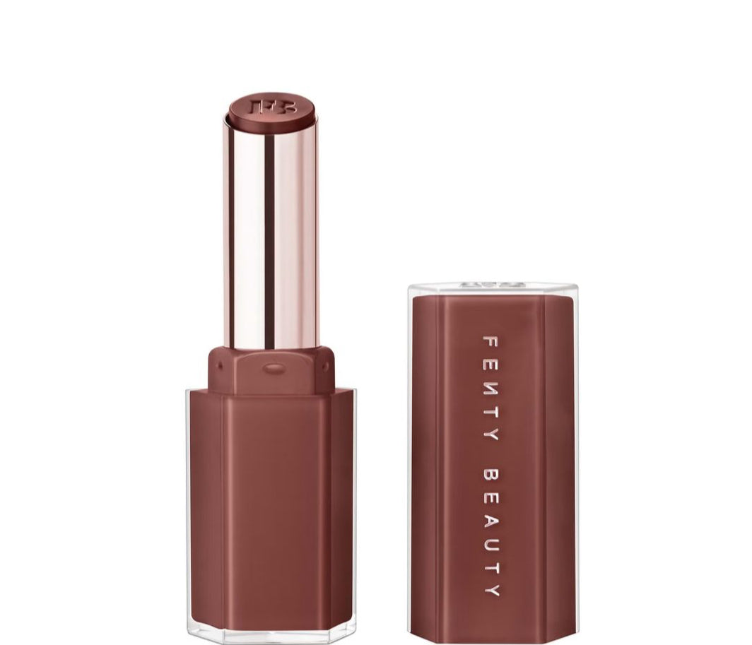 Fenty Beauty lipstick with case on a white background